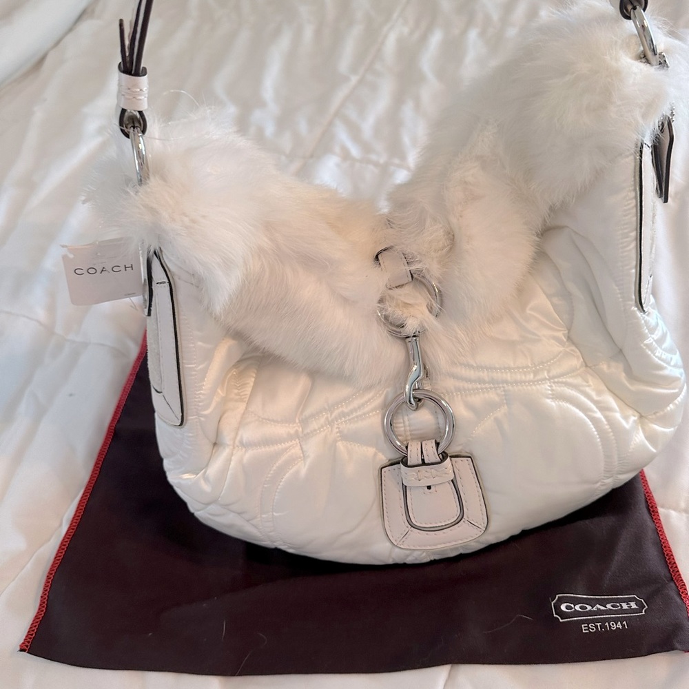 Coach purse with tags. Super cute! Perfect for the holidays.